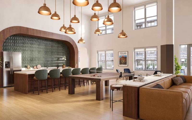 a clubroom with a couch, tables and chairs